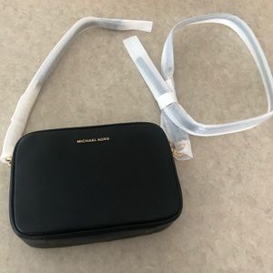 Authentic Michael Kors Ginny Leather Crossbody Bag in black with gold detailing